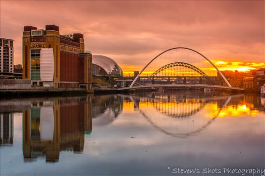 A sunset on the River Tyne with the Baltic, Sage, Millennium Bridge and Tyne Bridge, also a good reflection in the water.